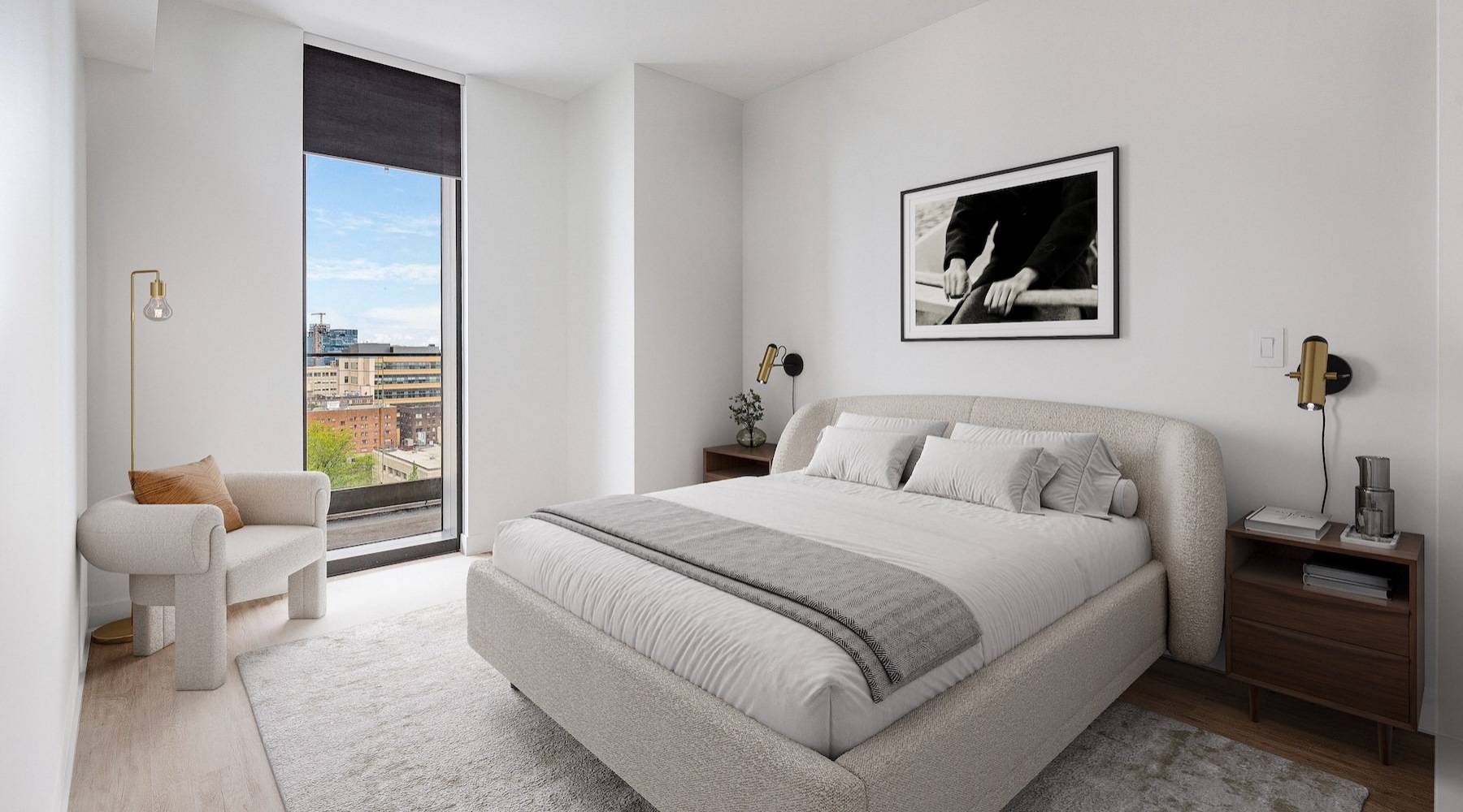 a bedroom with a bed, chair and two nightstands